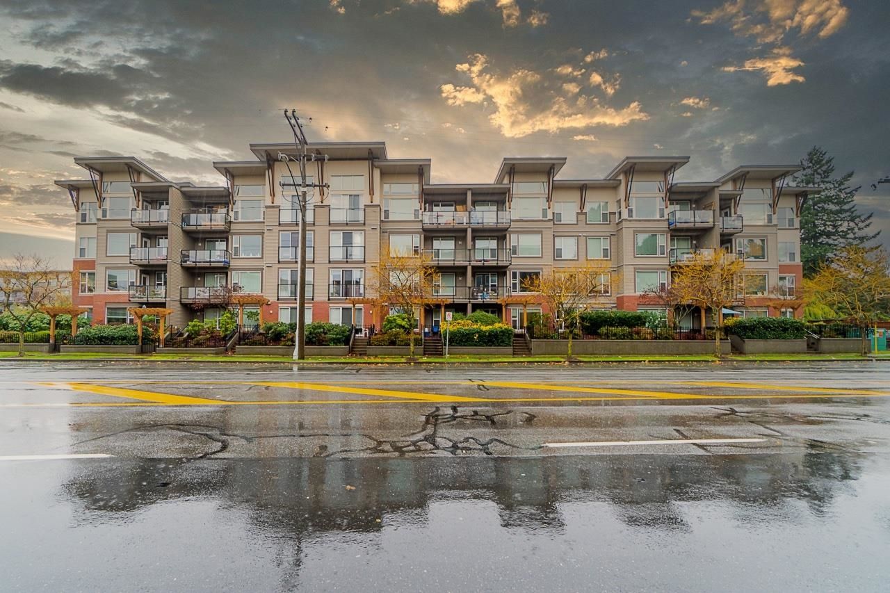 Main Photo: 405 33538 MARSHALL Road in Abbotsford: Central Abbotsford Condo for sale in "THE CROSSING" : MLS®# R2633073