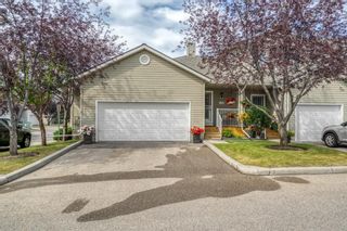 Photo 1: 120 Mt. Aberdeen Manor SE in Calgary: McKenzie Lake Row/Townhouse for sale : MLS®# A1246197