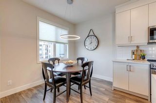 Photo 11: 217 8355 19 Avenue SW in Calgary: Springbank Hill Apartment for sale : MLS®# A2109556