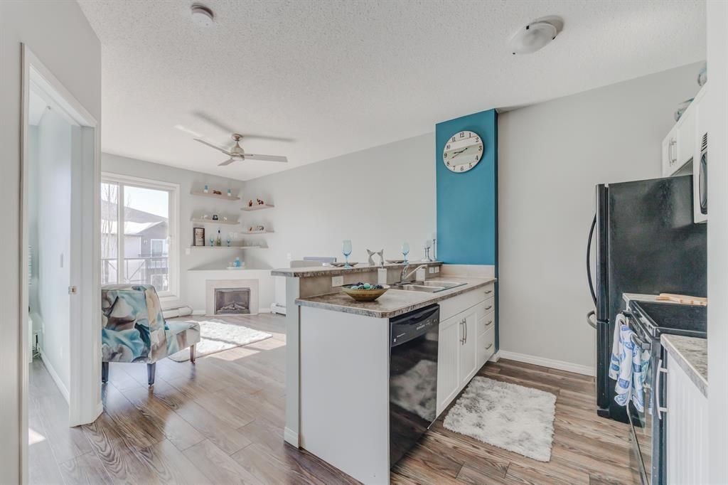 Main Photo: 404 1727 54 Street SE in Calgary: Penbrooke Meadows Apartment for sale : MLS®# A2029798