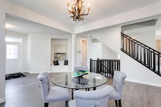 Photo 6: 25 Tremblant Terrace SW in Calgary: Springbank Hill Detached for sale : MLS®# A1240096