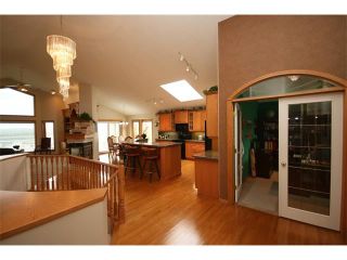 Photo 5: 315 GLENEAGLES View: Cochrane House for sale : MLS®# C4014401