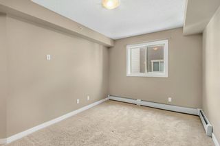 Photo 18: 9404 403 Mackenzie Way SW: Airdrie Apartment for sale : MLS®# A2010407