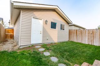 Photo 48: 1072 Kings Heights Road SE: Airdrie Semi Detached (Half Duplex) for sale : MLS®# A1257434