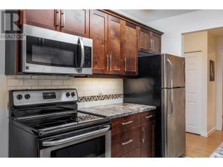 Photo 7: 1056 Bernard Avenue Unit# 203 in Kelowna: House for sale : MLS®# 10308135