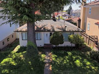 Photo 1: 748 W 61ST Avenue in Vancouver: Marpole House for sale in "Marpole" (Vancouver West)  : MLS®# R2873349