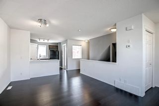 Photo 6: 92 Panamount Drive NW in Calgary: Panorama Hills Row/Townhouse for sale : MLS®# A1209028