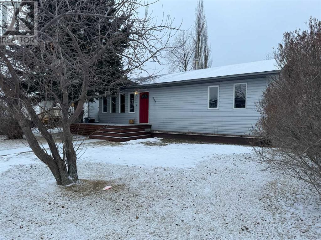 Main Photo: 329 3 Avenue NW in Slave Lake: House for sale : MLS®# A2105897