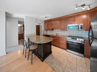 Photo 4: 103 1420 Memorial Drive NW in Calgary: Hillhurst Apartment for sale : MLS®# A2001153