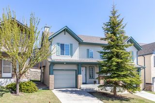 Photo 2: 85 Hidden Creek Rise NW in Calgary: Hidden Valley Row/Townhouse for sale : MLS®# A1104213