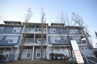 Photo 1: 57 Auburn Bay Common SE in Calgary: Auburn Bay Row/Townhouse for sale : MLS®# A2013754