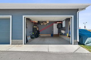 Photo 40: 108 Creekside Drive SW in Calgary: C-168 Semi Detached (Half Duplex) for sale : MLS®# A2004338