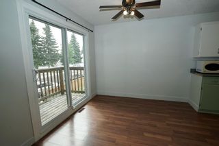 Photo 5: 11427A 8 Street SW in Calgary: Southwood Row/Townhouse for sale : MLS®# A1035689