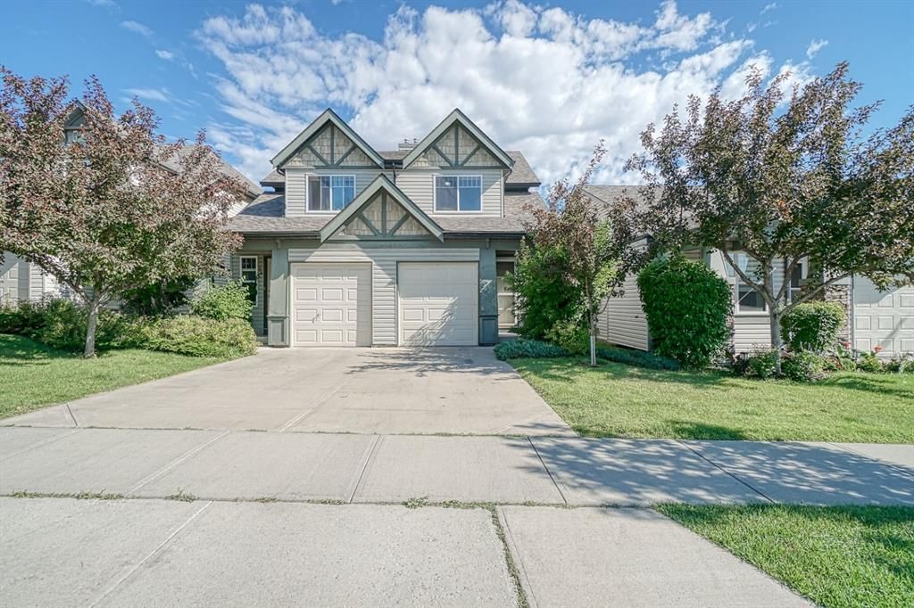 Main Photo: 72 Everstone Boulevard SW in Calgary: Evergreen Row/Townhouse for sale : MLS®# A1244736