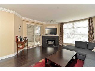 Photo 2: 210 19131 FORD Road in Pitt Meadows: Central Meadows Condo for sale in "WOODFORD MANOR" : MLS®# V996523