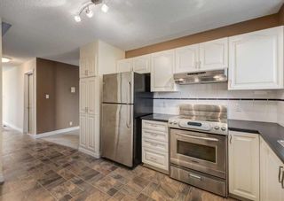 Photo 14: 132 Prominence Heights SW in Calgary: Patterson Row/Townhouse for sale : MLS®# A2080383