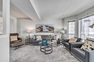 Photo 2: 32 Martinglen Mews NE in Calgary: Martindale Detached for sale : MLS®# A1208738