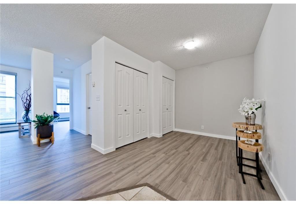 Main Photo: 304 1111 6 Avenue SW in Calgary: Downtown West End Apartment for sale : MLS®# A2063943