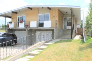 Photo 1: 603 54 Avenue SW in Calgary: Windsor Park Semi Detached (Half Duplex) for sale : MLS®# A1245443