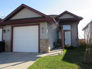 Photo 33: 742 Carriage Lane Drive: Carstairs Semi Detached for sale : MLS®# A1168792