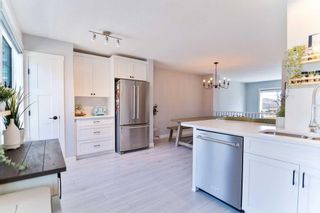 Photo 15: 655 Cranbrook Walk SE in Calgary: Cranston Row/Townhouse for sale : MLS®# A2122353