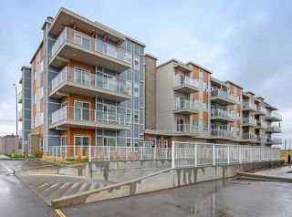 Photo 2: 402 200 Harvest Hills Place NE in Calgary: Harvest Hills Apartment for sale : MLS®# A2128763