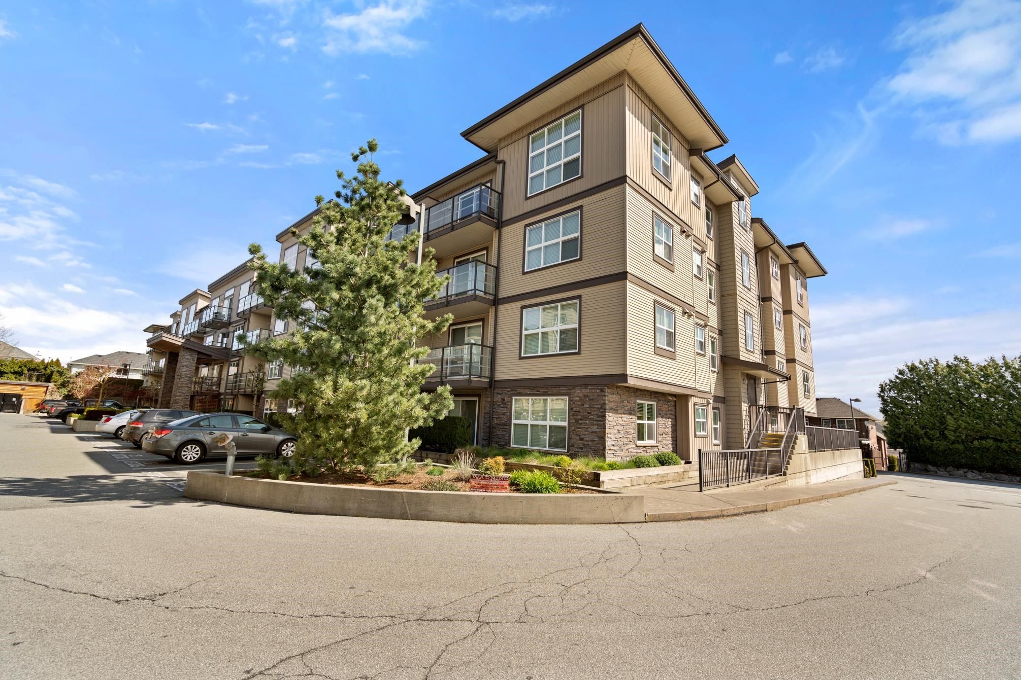 Main Photo: 419 30525 CARDINAL Avenue in Abbotsford: Abbotsford West Condo for sale in "TAMARIND WESTSIDE" : MLS®# R2695691