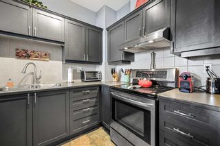 Photo 10: 404 8000 Wentworth Drive SW in Calgary: West Springs Row/Townhouse for sale : MLS®# A2128381