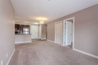 Photo 8: 211 403 Mackenzie Way SW: Airdrie Apartment for sale : MLS®# A2125740