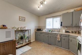 Photo 4: 7406 34 Avenue NW in Calgary: Bowness Semi Detached for sale : MLS®# A1186392