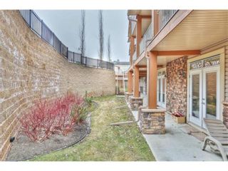 Photo 12: 1 169 Rockyledge View NW in Calgary: Rocky Ridge Row/Townhouse for sale : MLS®# A1241867