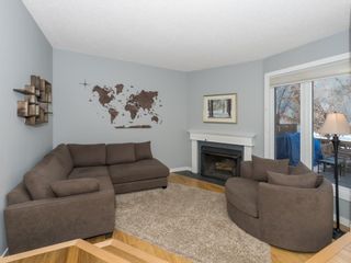 Photo 19: 360 Point Mckay Gardens NW in Calgary: Point McKay Row/Townhouse for sale : MLS®# A2019988