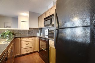 Photo 8: 6 305 VILLAGE Mews SW in CALGARY: Prominence_Patterson Condo for sale (Calgary)  : MLS®# C3599226