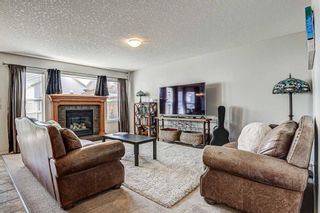 Photo 4: 28 Cougarstone Square SW in Calgary: Cougar Ridge Detached for sale : MLS®# A1099416