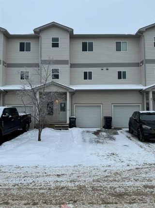 Photo 1: 98 313 Millennium Drive: Fort McMurray Row/Townhouse for sale : MLS®# A2102877