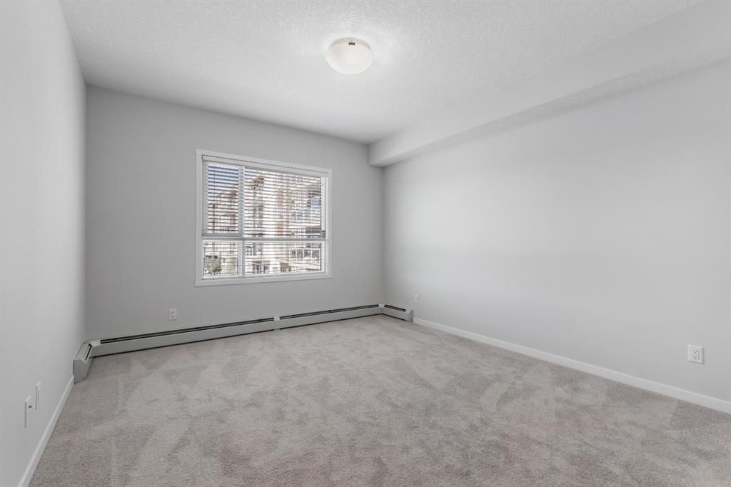 Photo 9: Photos: 309 300 Harvest Hills Place NE in Calgary: Harvest Hills Apartment for sale : MLS®# A1123007