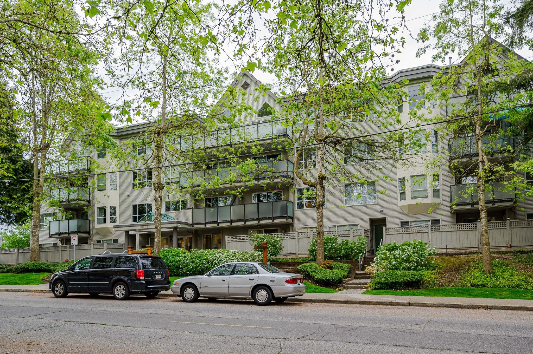 Main Photo: 107 20088 55A Avenue in Langley: Langley City Condo for sale : MLS®# R2695062