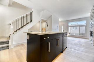 Photo 13: 512 32 Street NW in Calgary: Parkdale Row/Townhouse for sale : MLS®# A2050532