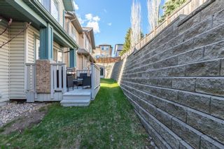 Photo 34: 85 Hidden Creek Rise NW in Calgary: Hidden Valley Row/Townhouse for sale : MLS®# A1104213