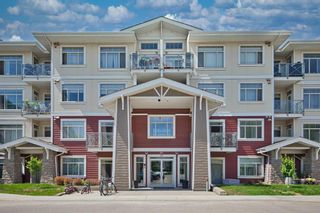 Photo 1: 403 10 Auburn Bay Link SE in Calgary: Auburn Bay Apartment for sale : MLS®# A2054806