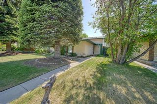 Photo 1: 56 Midlawn Place SE in Calgary: Midnapore Detached for sale : MLS®# A2056230