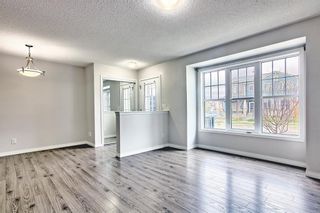 Photo 2: 4140 Windsong Boulevard SW: Airdrie Row/Townhouse for sale : MLS®# A1099382