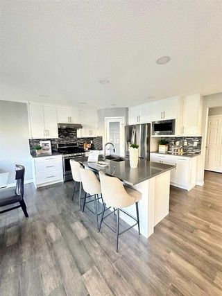 Photo 9: 98 Evansbrooke Park NW in Calgary: Evanston Detached for sale : MLS®# A2124358
