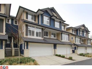 Photo 1: 21 18199 70TH Avenue in Surrey: Cloverdale BC Townhouse for sale in "AUGUSTA" (Cloverdale)  : MLS®# F1105716