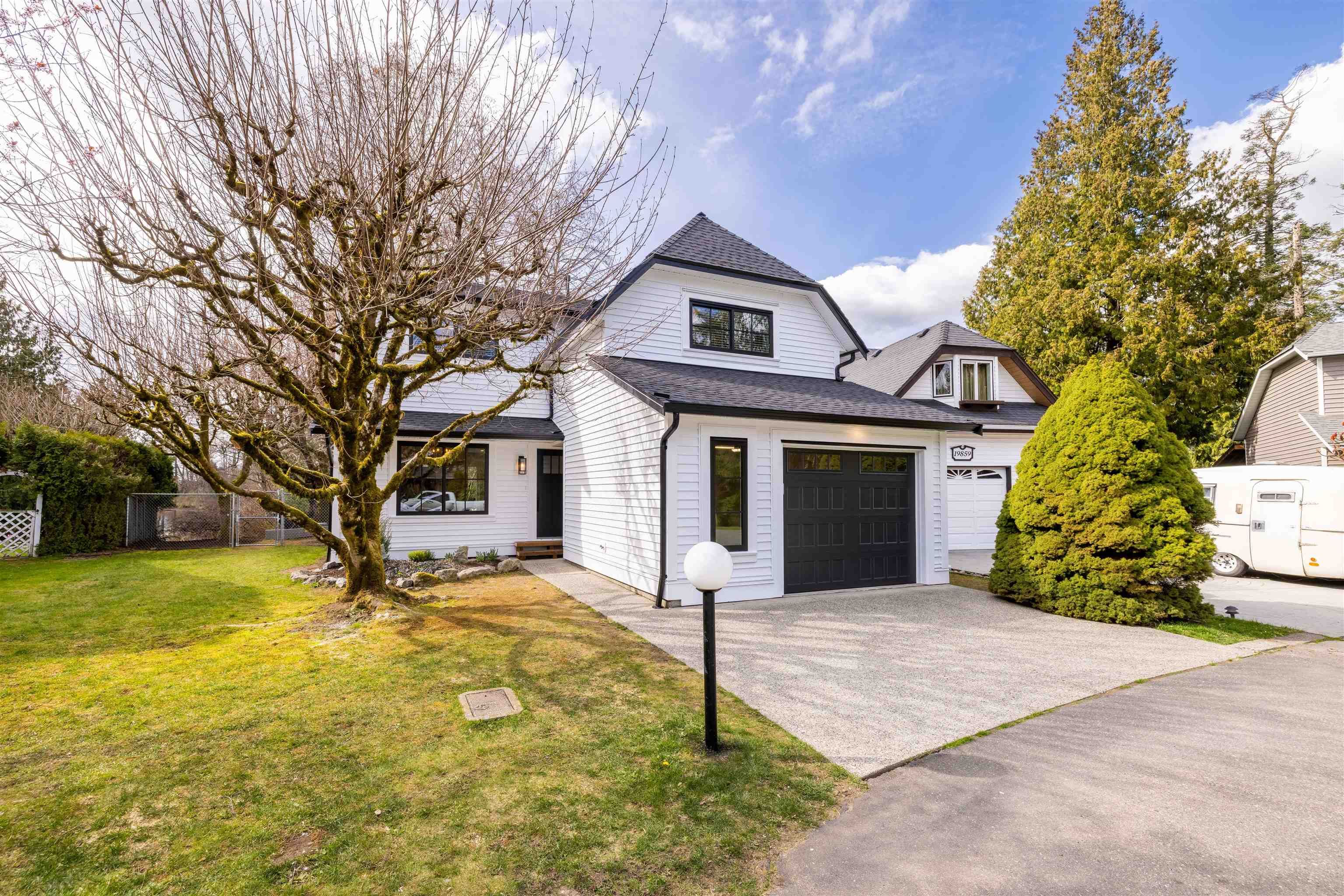 Main Photo: 19857 50A Avenue in Langley: Langley City House for sale : MLS®# R2765428