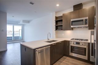 Photo 2: 615 88 9 Street NE in Calgary: Bridgeland/Riverside Apartment for sale : MLS®# A1172279