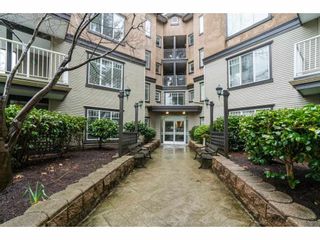 Photo 2: 206 20288 54 Avenue in Langley: Langley City Condo for sale in "Cavalier Court" : MLS®# R2150776