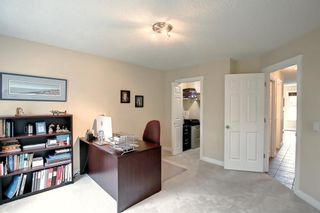 Photo 29: 26 Somme Boulevard SW in Calgary: Garrison Woods Row/Townhouse for sale : MLS®# A1253858