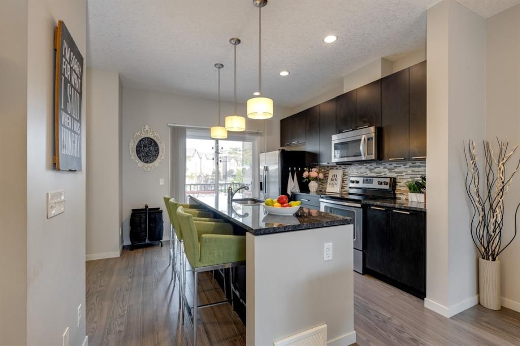 Main Photo: 327 Copperpond Row SE in Calgary: Copperfield Row/Townhouse for sale : MLS®# A1257865