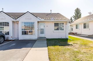 Photo 2: 14 209 Woodside Drive NW: Airdrie Row/Townhouse for sale : MLS®# A1211834